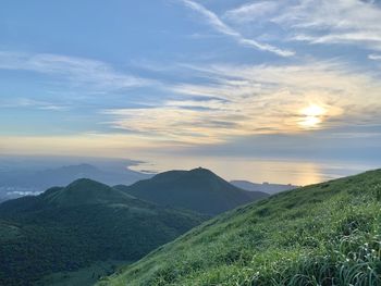 Scenic view of landscape against sky during sunset
