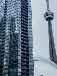 Low angle view of modern buildings against sky