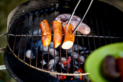 Close-up of meat on barbecue grill