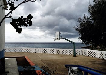 Scenic view of sea against cloudy sky