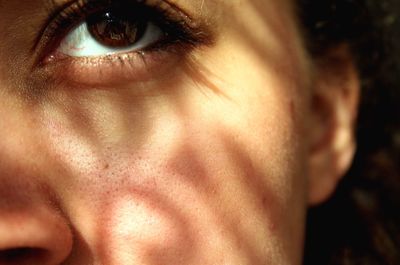 Close-up of woman eye and cheek