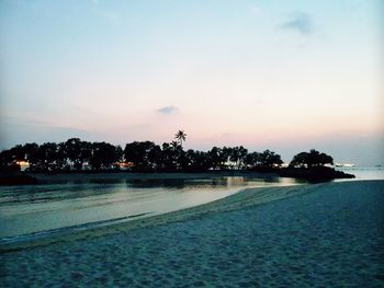 Scenic view of sea against sky at sunset