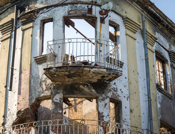 Low angle view of old abandoned building