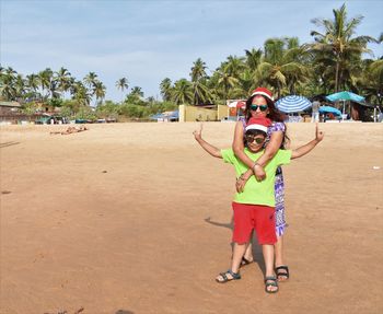 Full length of man standing on beach