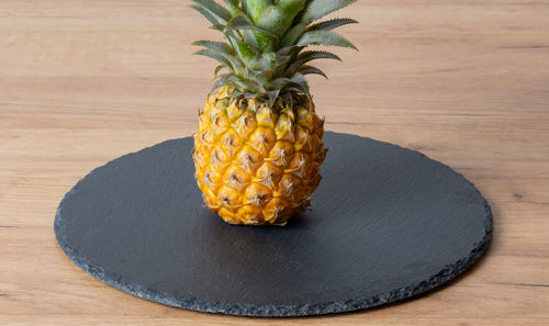 Close-up of pineapple on table