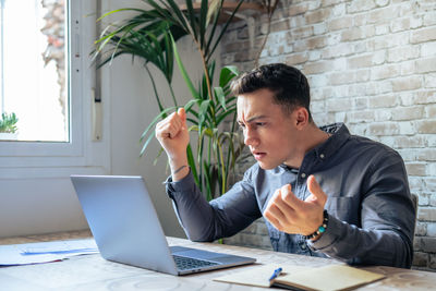 Young man working at office