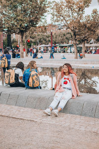 Group of people sitting in park