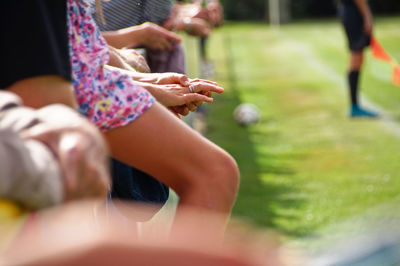 Low section of people playing outdoors