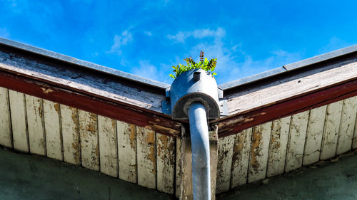 Low angle view of building against blue sky