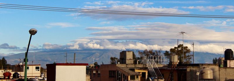 Building against cloudy sky