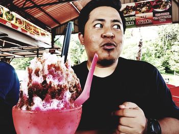 Portrait of man with ice cream
