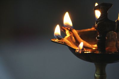 Close-up of lit diya