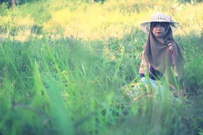 Woman standing on field