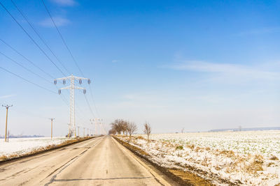 Empty road against sky