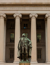 Low angle view of statue of historical building