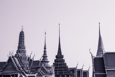 Low angle view of buildings against clear sky