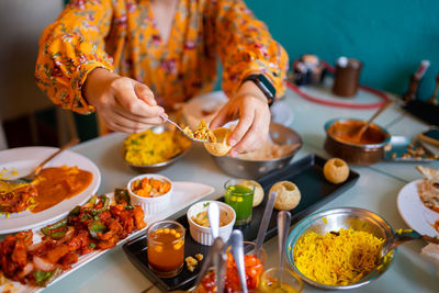 Indian food curry butter chicken, palak paneer, chiken tikka, biryani, vegetable curry.