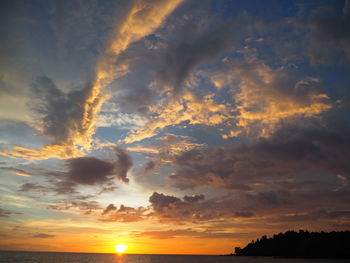 Low angle view of dramatic sky during sunset