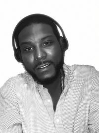 Portrait of young man against white background