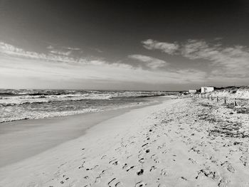 Scenic view of beach against sky