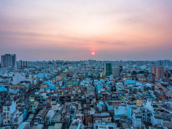 High angle view of townscape against sky during sunset