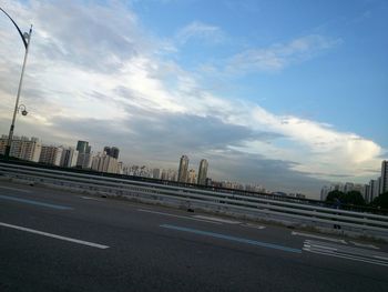 Road against cloudy sky