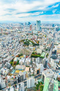 High angle view of buildings against sky in city