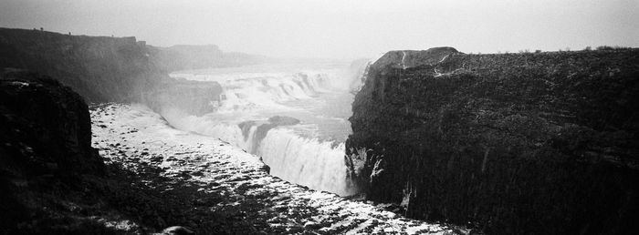 Scenic view of trees against sky