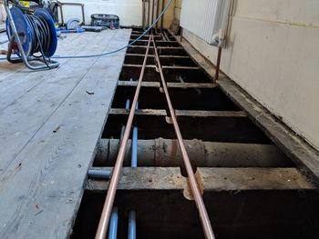 High angle view of ladder in abandoned building