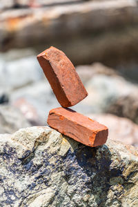 Close-up of rusty metal on rock