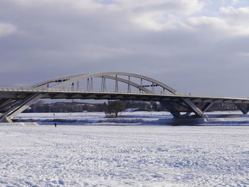 Bridge against sky during winter
