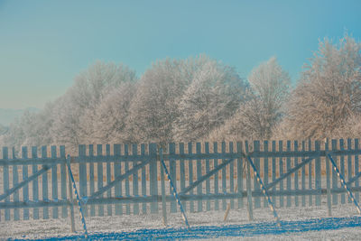 Fence against clear sky