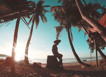 Under the palms