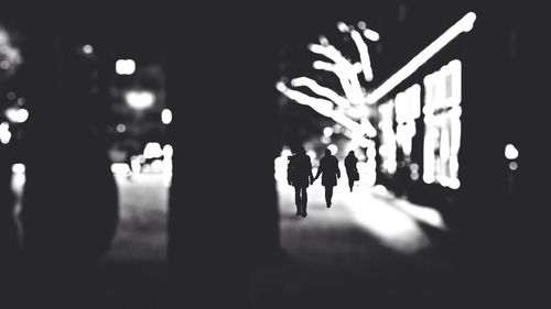 Blurred motion of people at night