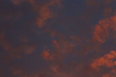 Low angle view of dramatic sky during sunset