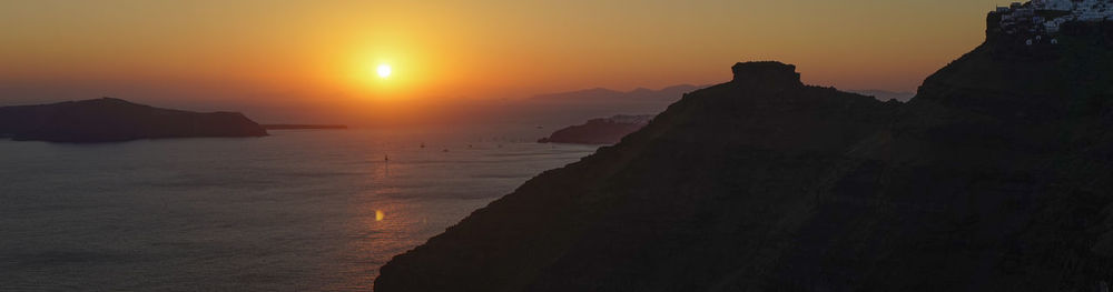 Scenic view of sea at sunset