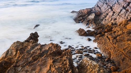 High angle view of rocks on coast