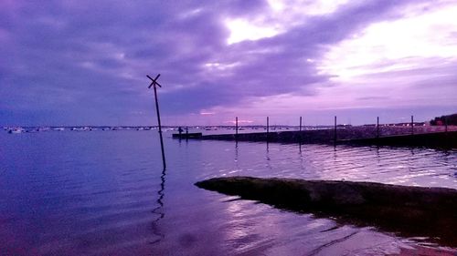 Scenic view of sea against cloudy sky