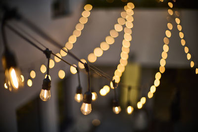 Close-up of illuminated christmas lights at night