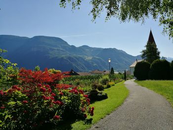 Scenic view of village against mountain landscape