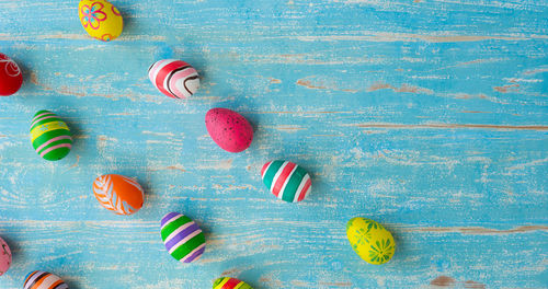 High angle view of multi colored candies on table