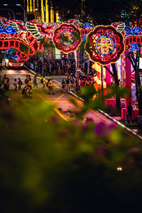 People on street at night