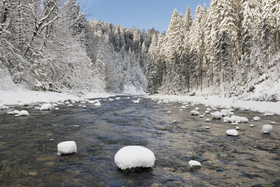 River in canyon with ice and snow at cold winterday