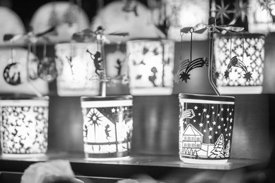 Close-up of decorations hanging on table