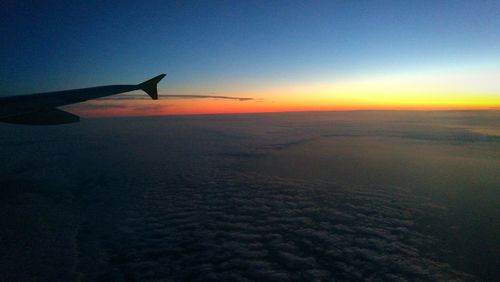 Scenic view of sea against clear sky during sunset