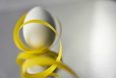 Close-up of yellow flower on table