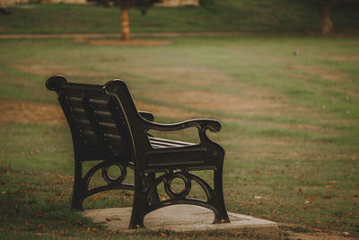 Empty bench in park