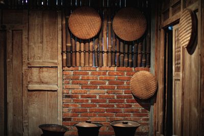 View of wicker basket on table against wall