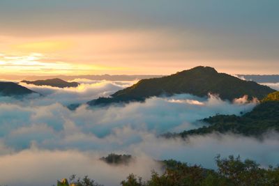 Scenic view of mountains against sky during sunset