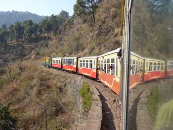 Close-up of train window on railroad track